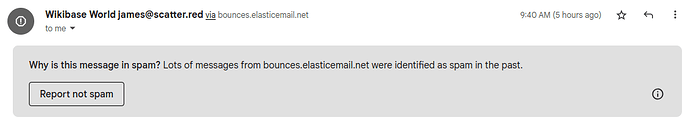Screenshot of a callout at the top of a Gmail email from Wikibase World. It says "Why is this message in spam? Lots of messages from bounces.elasticemail.net were identified as spam in the past."